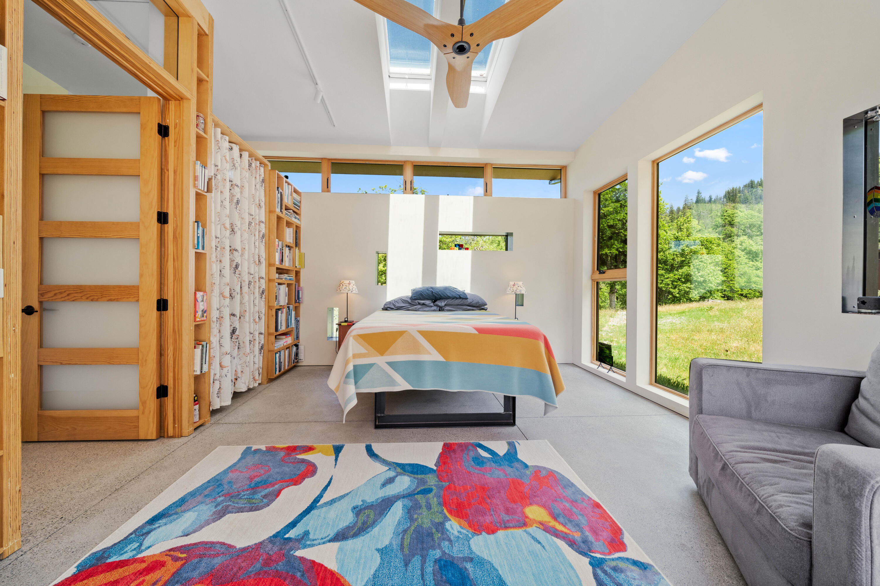 6691 Reading Creek Road Douglas City, CA 96024 - Photo 37 of 125 a living room with a bed furniture and a window