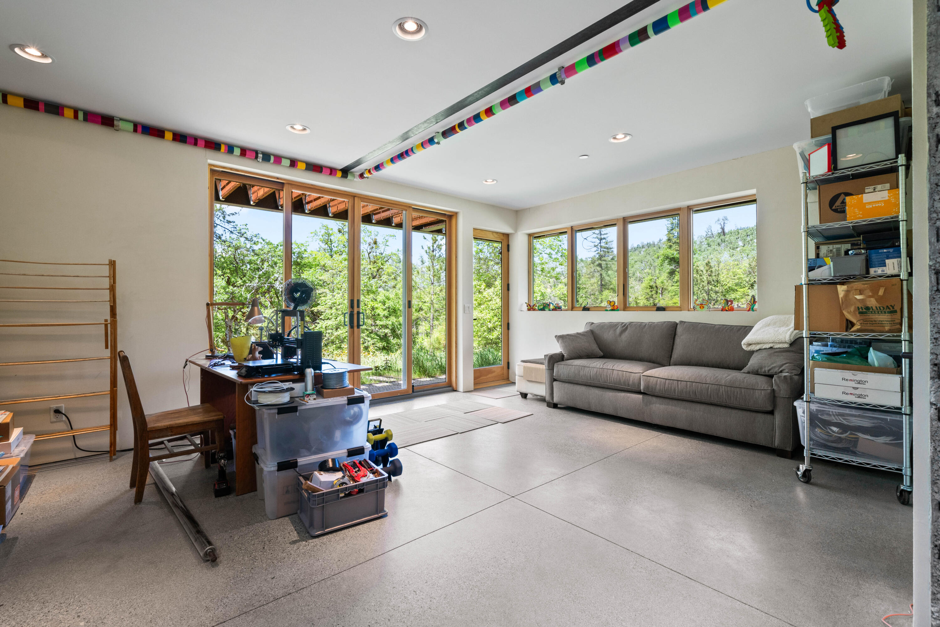 6691 Reading Creek Road Douglas City, CA 96024 - Photo 43 of 125 a living room with furniture and large windows