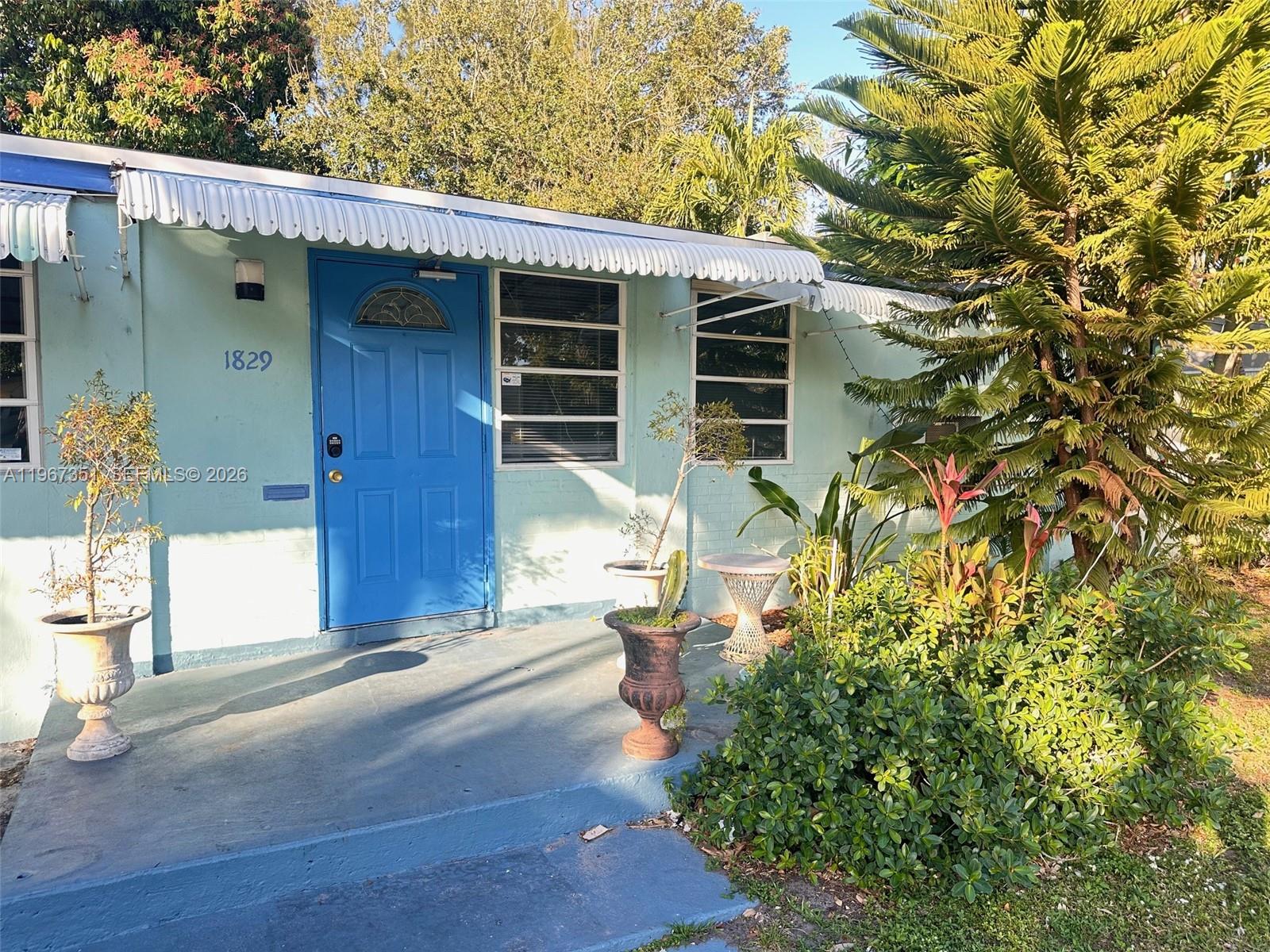 1829 Harding Street Hollywood, FL 33020 - Photo 4 of 15 a view of a house with potted plants