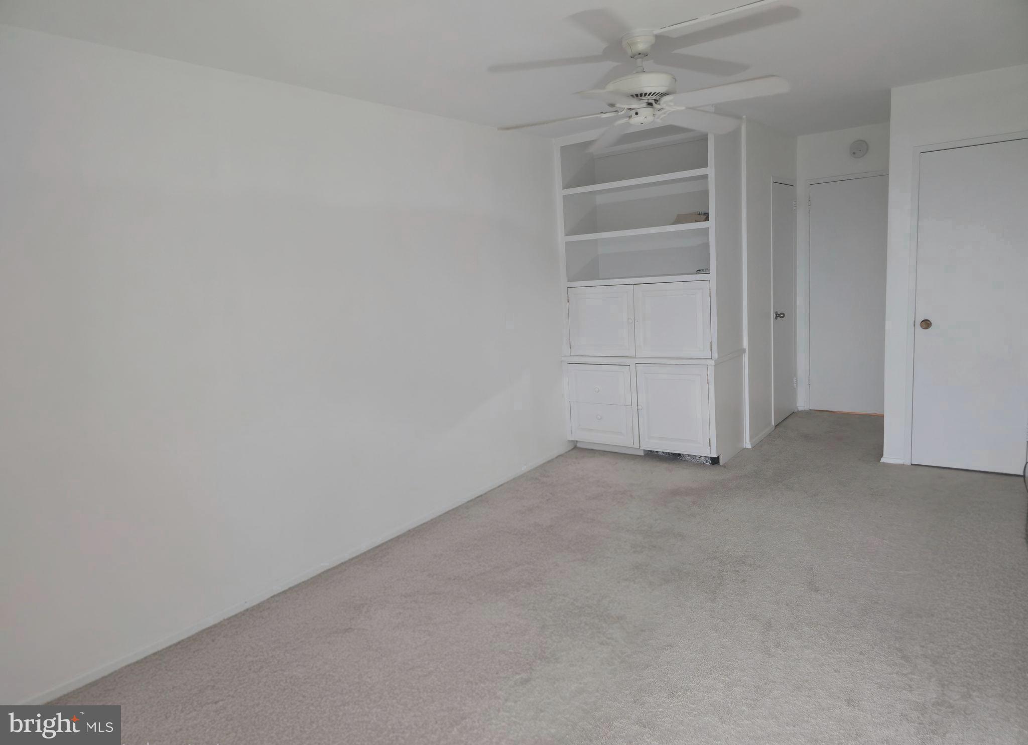 1425 4th Street Southwest, Unit A609 Washington, DC 20024 - Photo 6 of 12 a view of an empty room and a ceiling fan