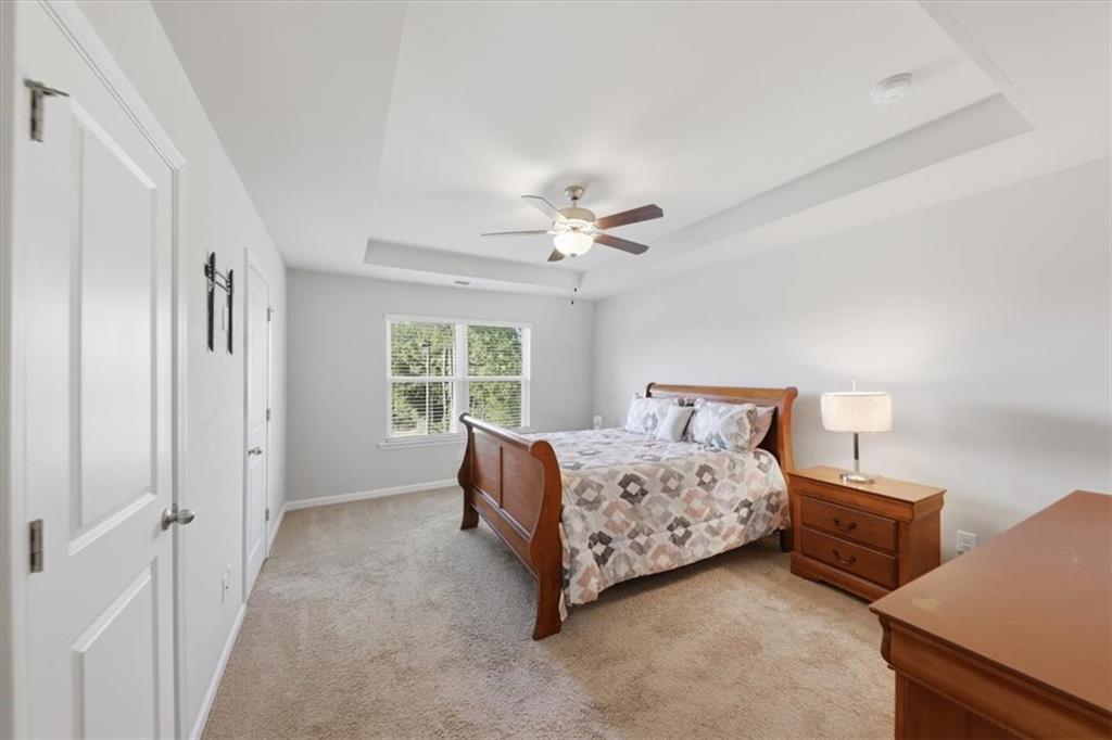 4154 Integrity Way Powder Springs, GA 30127 - Photo 26 of 52 a bed room with a bed and a window