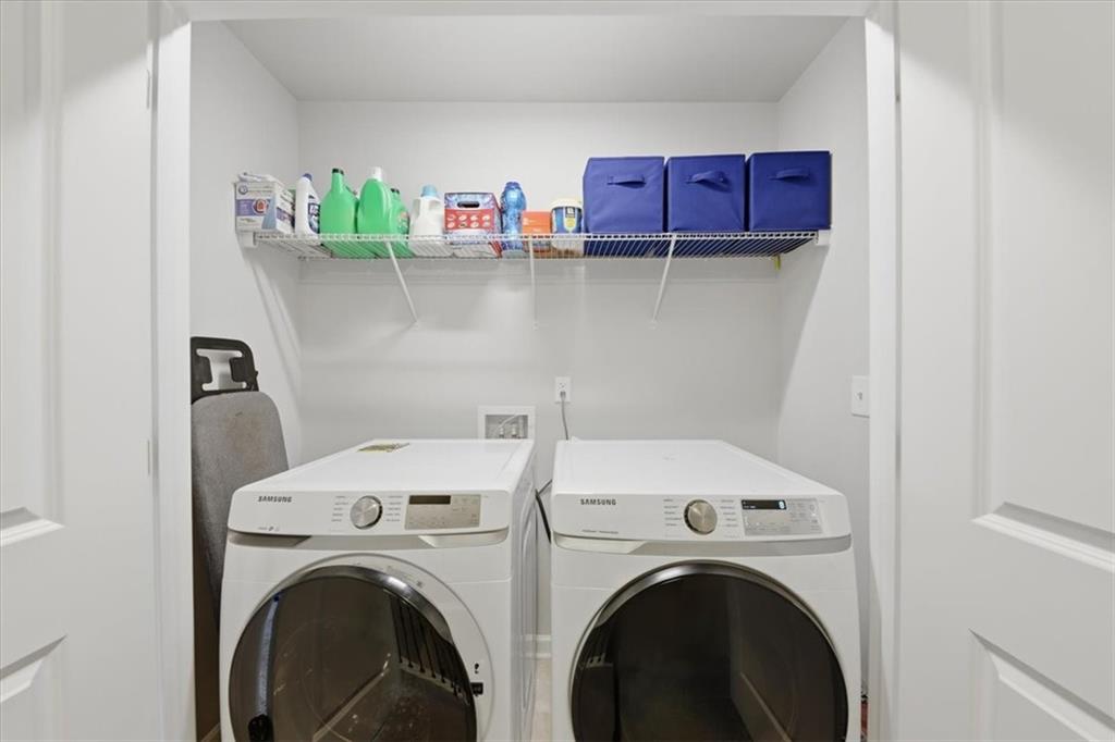 4154 Integrity Way Powder Springs, GA 30127 - Photo 33 of 52 a utility room with dryer and washer