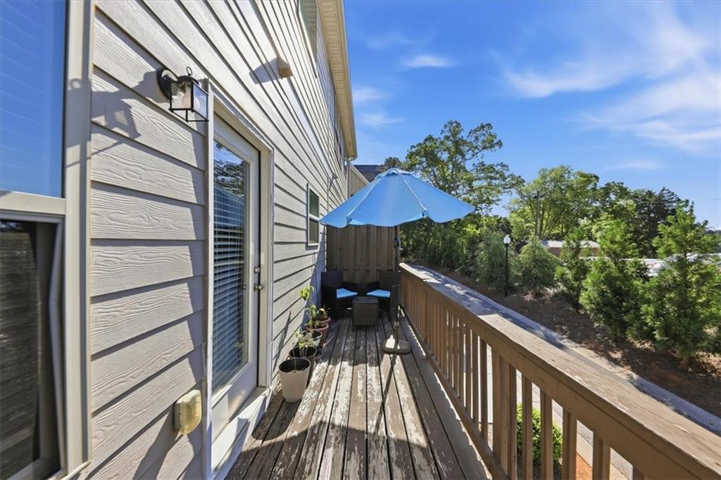 4154 Integrity Way Powder Springs, GA 30127 - Photo 44 of 52 a view of a balcony with two chairs
