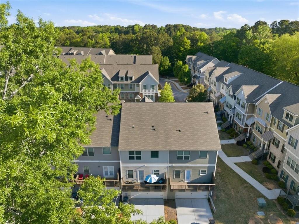4154 Integrity Way Powder Springs, GA 30127 - Photo 51 of 52 an aerial view of a house with garden space and street view