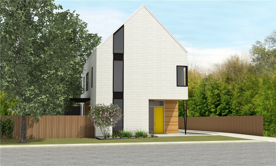 a view of a house with a yard and garage