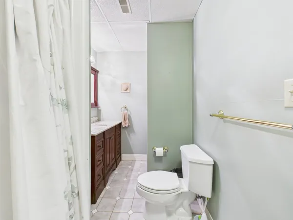 a view of balcony with wooden floor