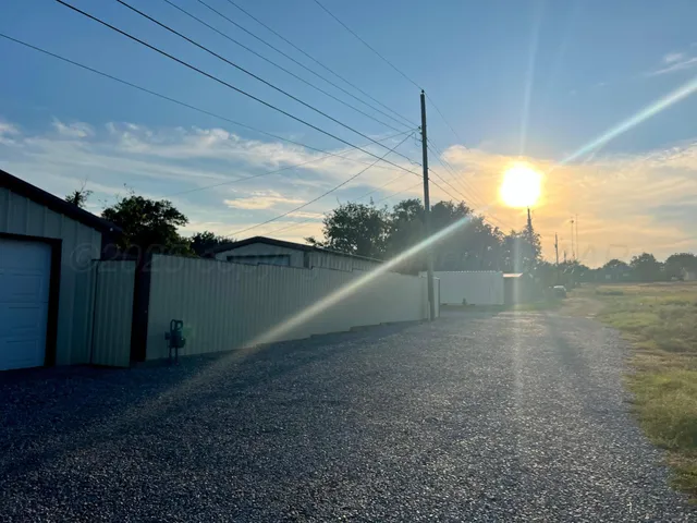 a view of a lake with a city
