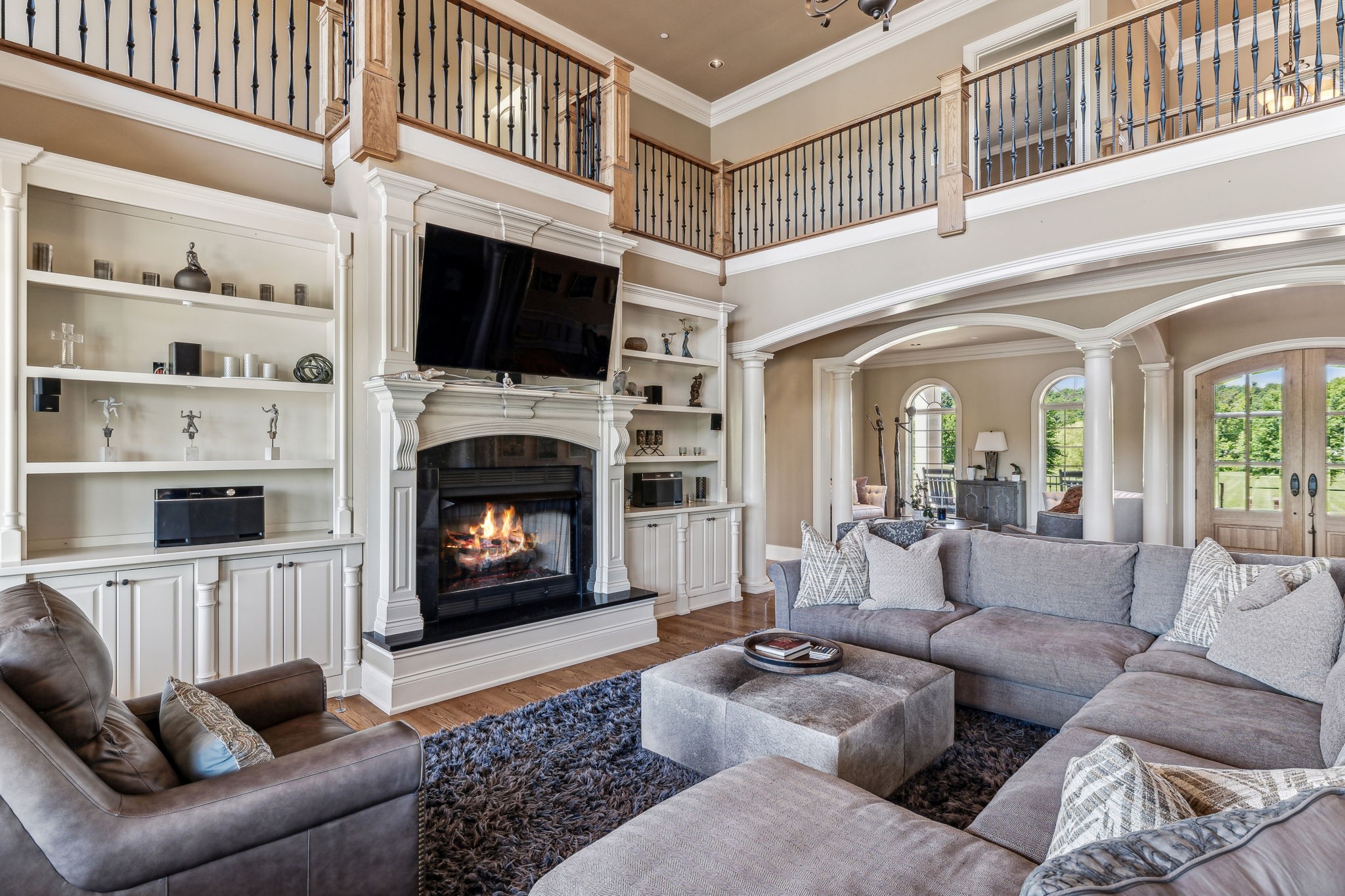 6035 River Trace Nashville, TN 37218 - Photo 14 of 68 a living room with furniture a flat screen tv and a fireplace