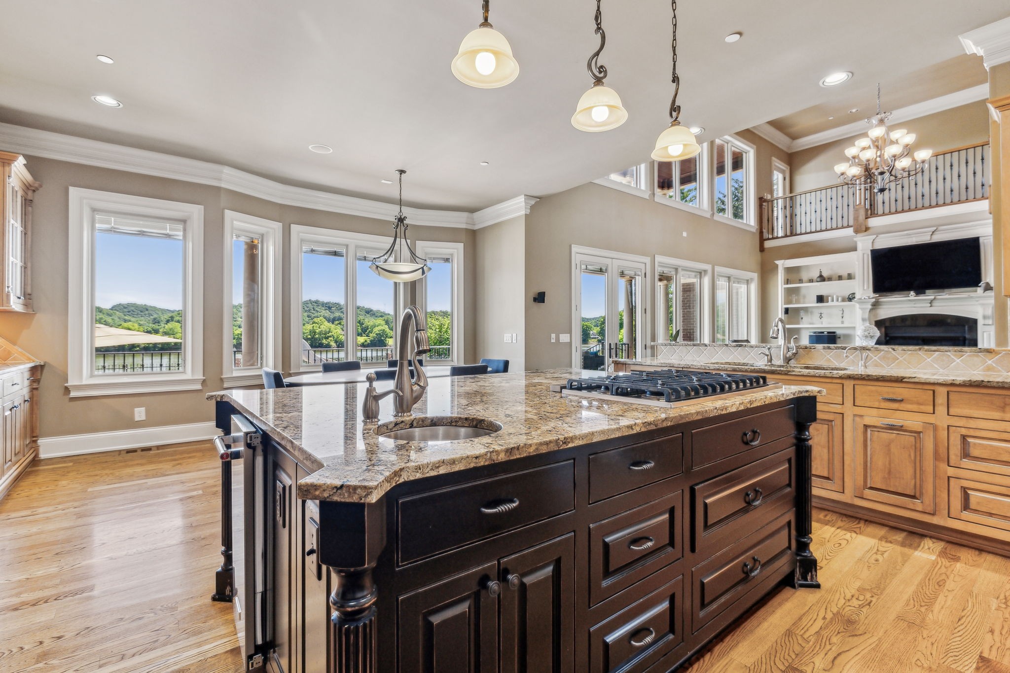 6035 River Trace Nashville, TN 37218 - Photo 20 of 68 a kitchen with granite countertop a stove a sink and a wooden floors