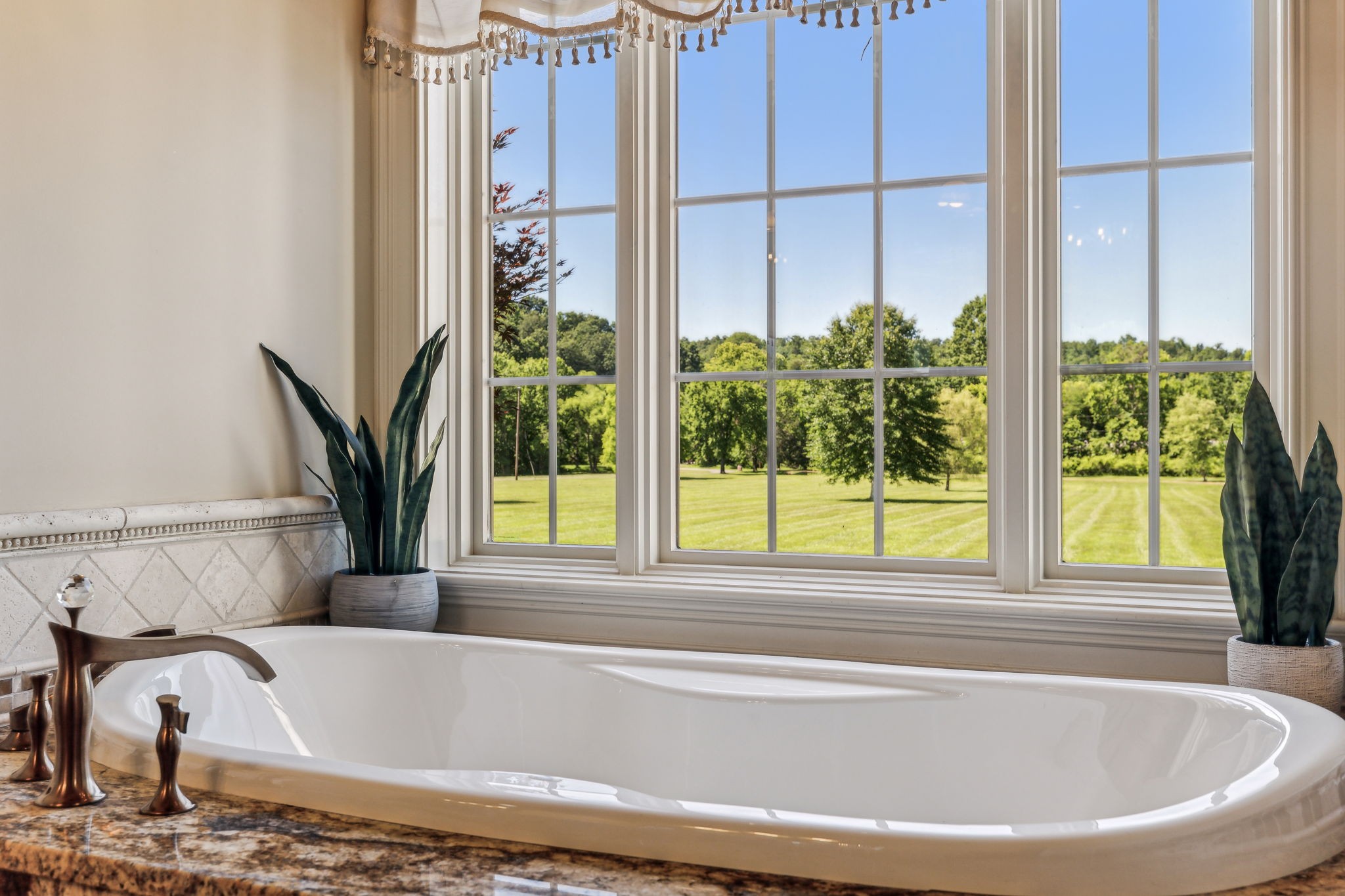 6035 River Trace Nashville, TN 37218 - Photo 33 of 68 a bathroom with bathtub and window
