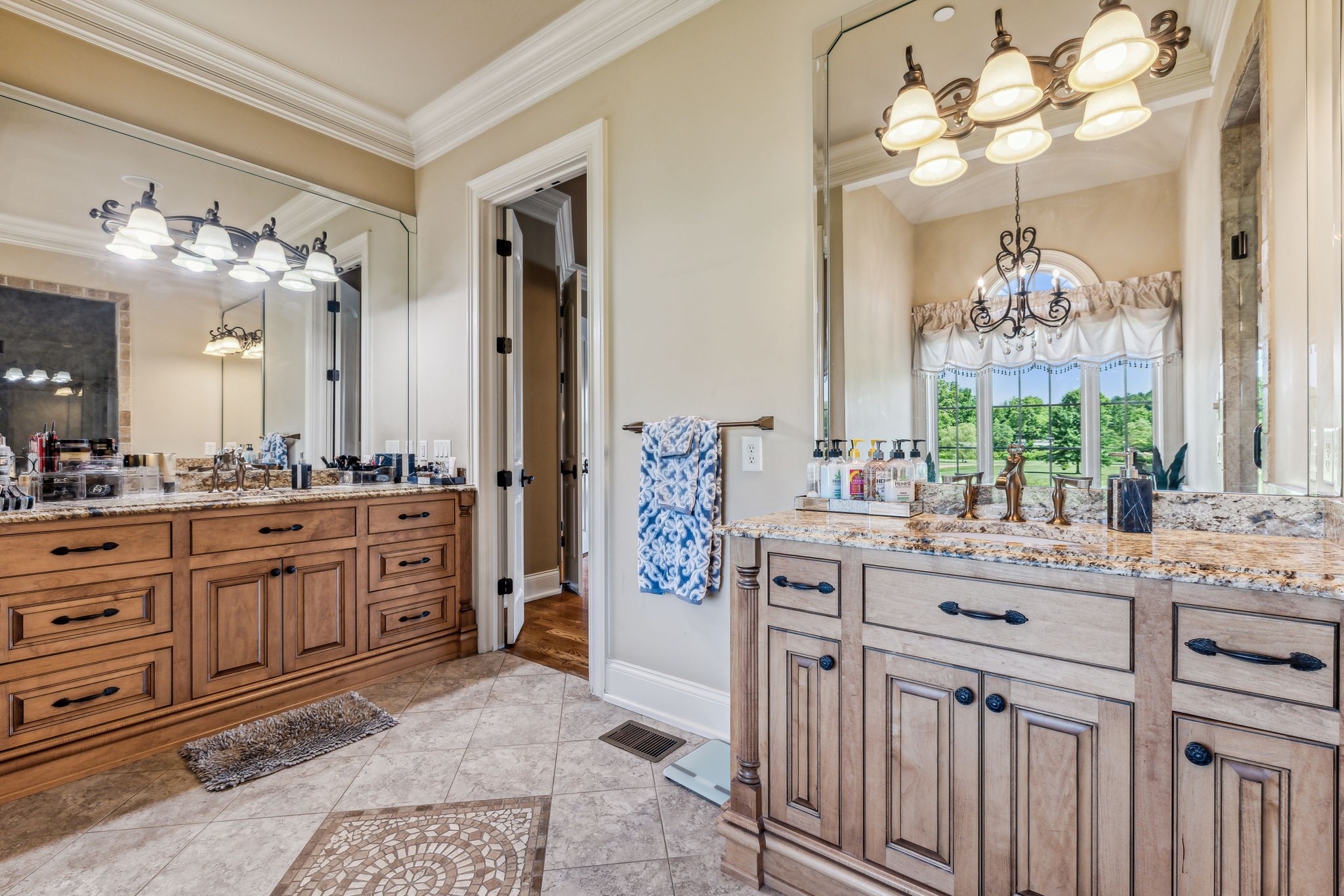 6035 River Trace Nashville, TN 37218 - Photo 34 of 68 a spacious bathroom with a granite countertop sink a large mirror and a shower