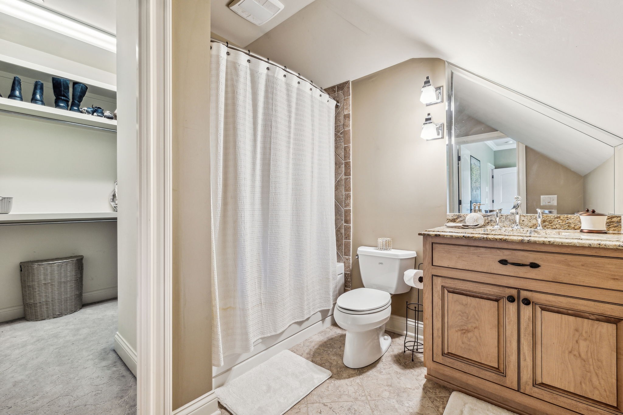 6035 River Trace Nashville, TN 37218 - Photo 38 of 68 a bathroom with a toilet a sink and a mirror