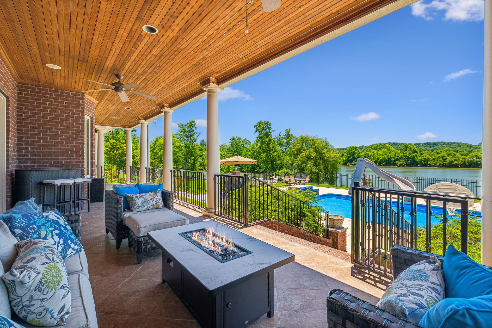 6035 River Trace Nashville, TN 37218 - Photo 50 of 68 a view of a patio with a table chairs and a floor to ceiling window