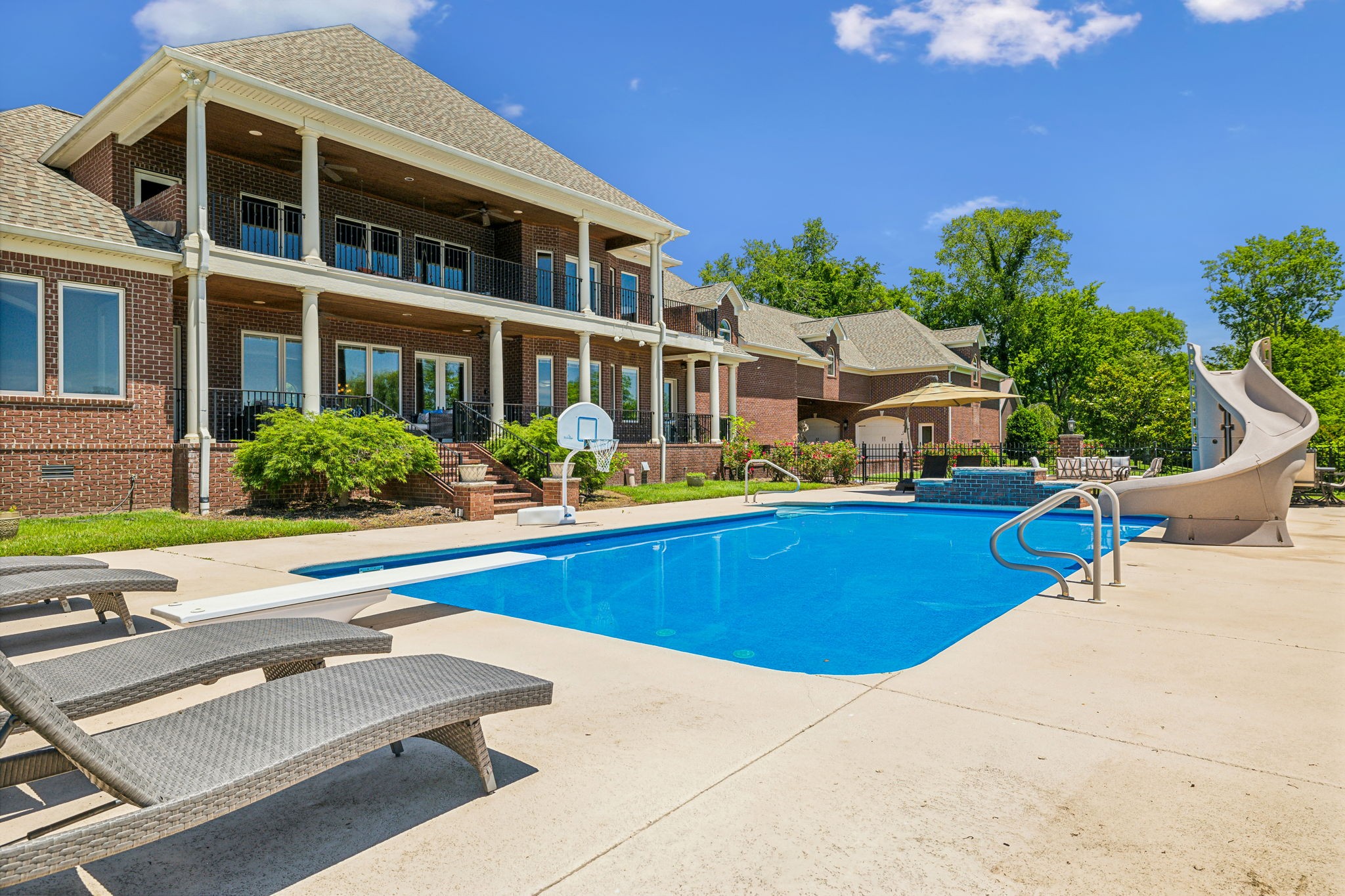 6035 River Trace Nashville, TN 37218 - Photo 53 of 68 a view of a house with pool and chairs