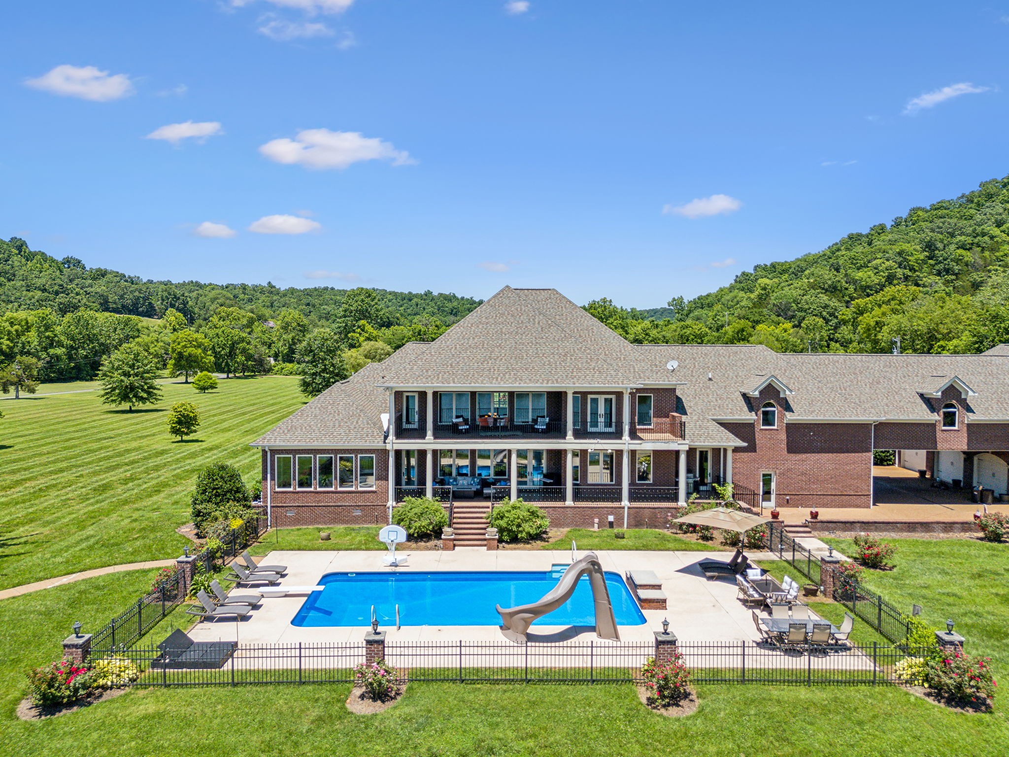 6035 River Trace Nashville, TN 37218 - Photo 54 of 68 a front view of house with yard swimming pool and green space