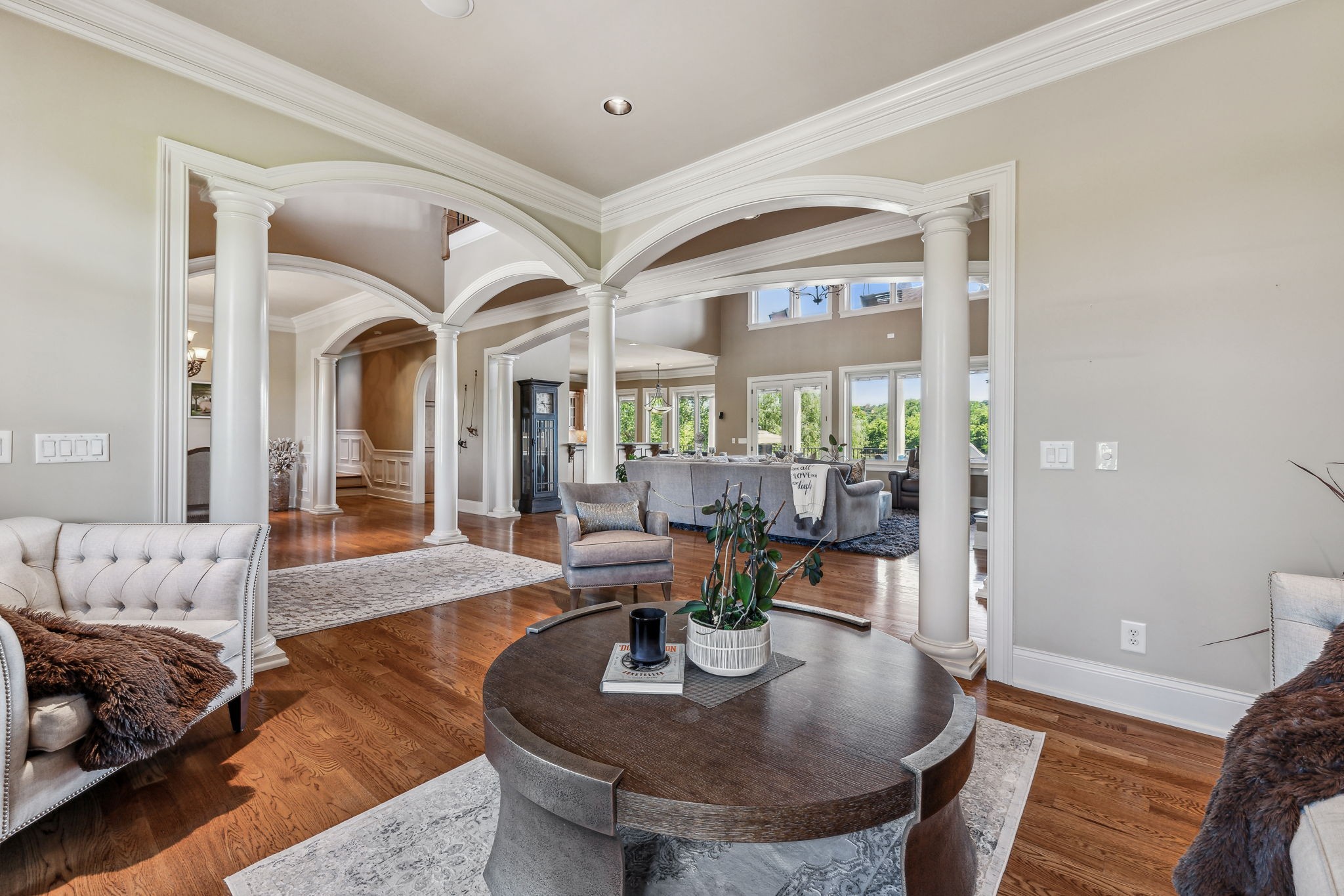 6035 River Trace Nashville, TN 37218 - Photo 10 of 68 a living room with furniture chandelier and wooden floor