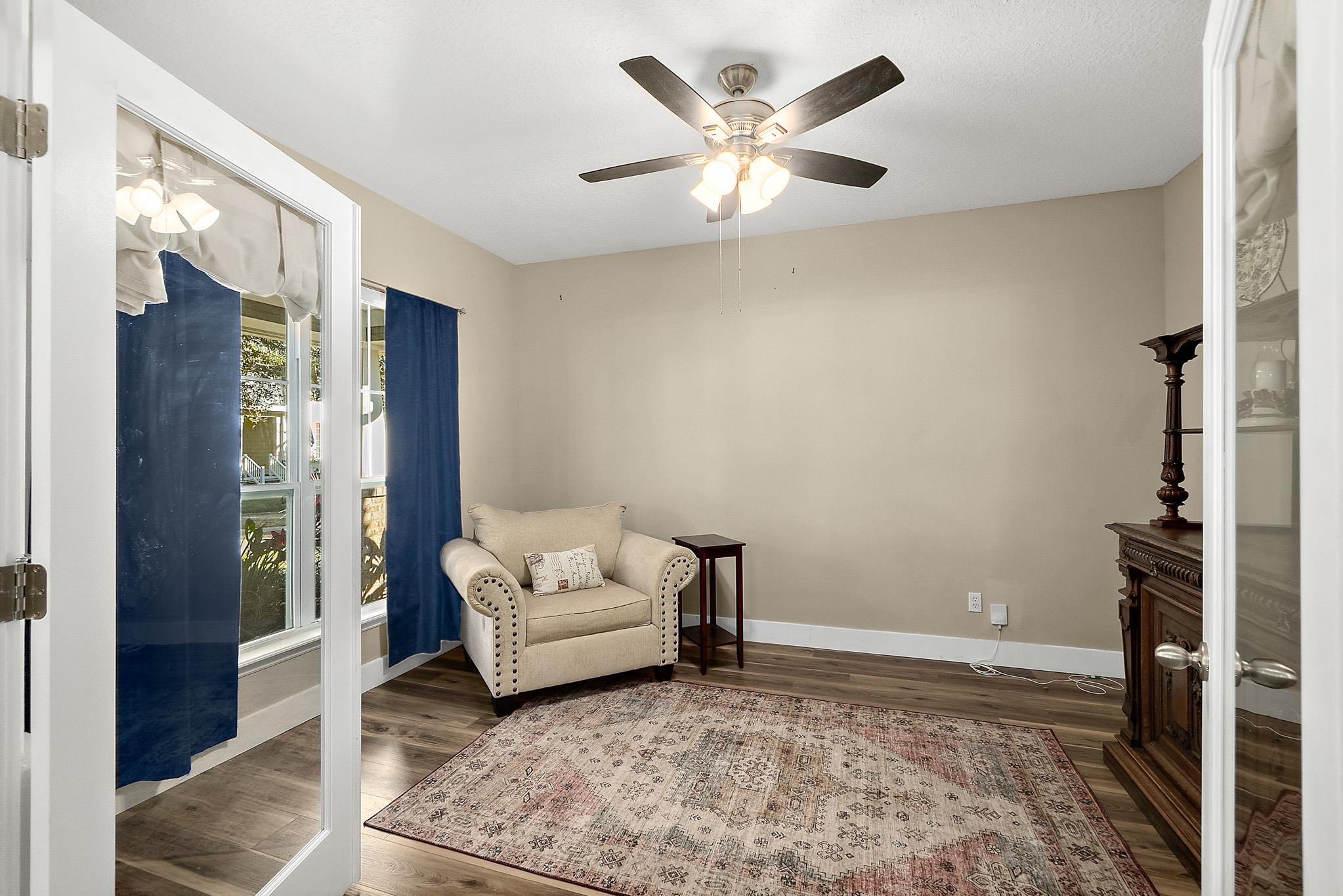 915 Saltwater Circle St. Augustine, FL 32080 - Photo 19 of 60 Sitting room with wood finished floors and ceiling fan