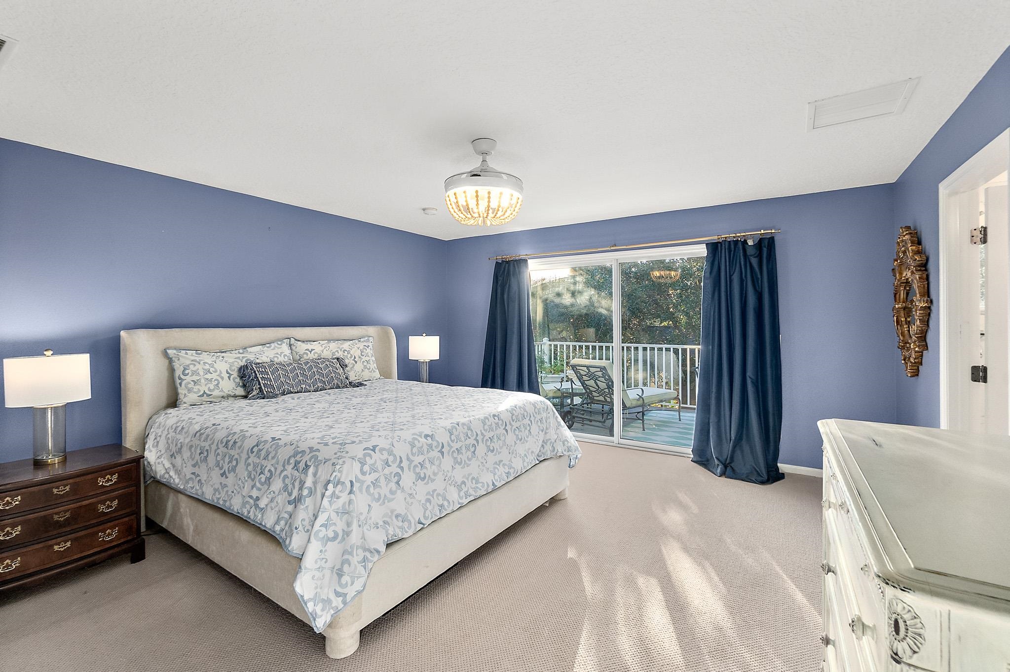 915 Saltwater Circle St. Augustine, FL 32080 - Photo 21 of 60 Bedroom featuring access to exterior and light colored carpet