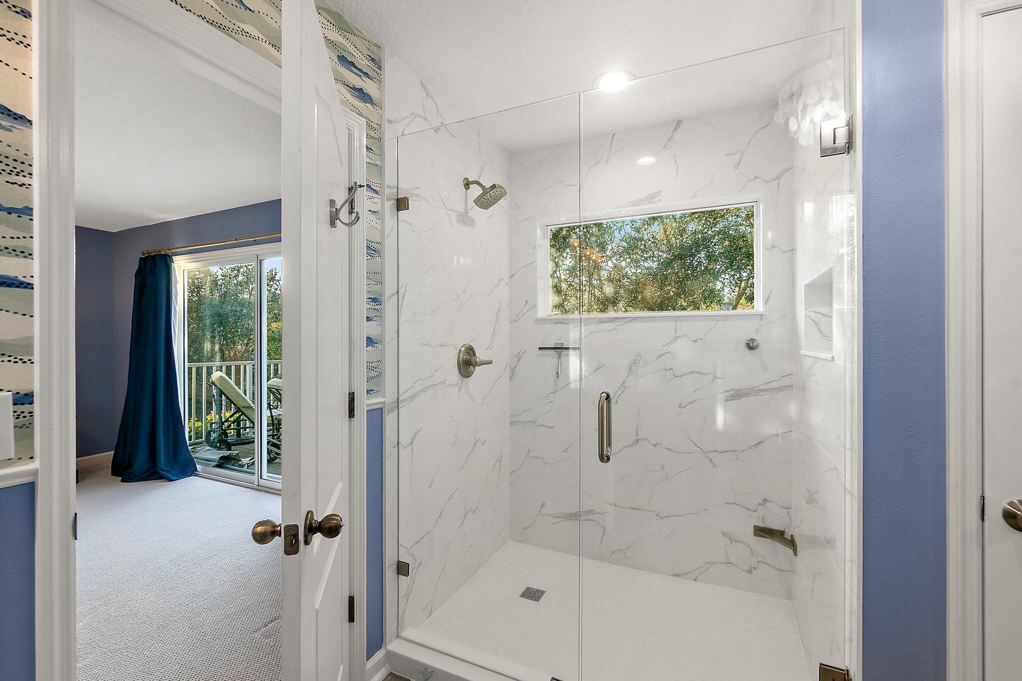 915 Saltwater Circle St. Augustine, FL 32080 - Photo 28 of 60 Full bath with new marble-look shower tile