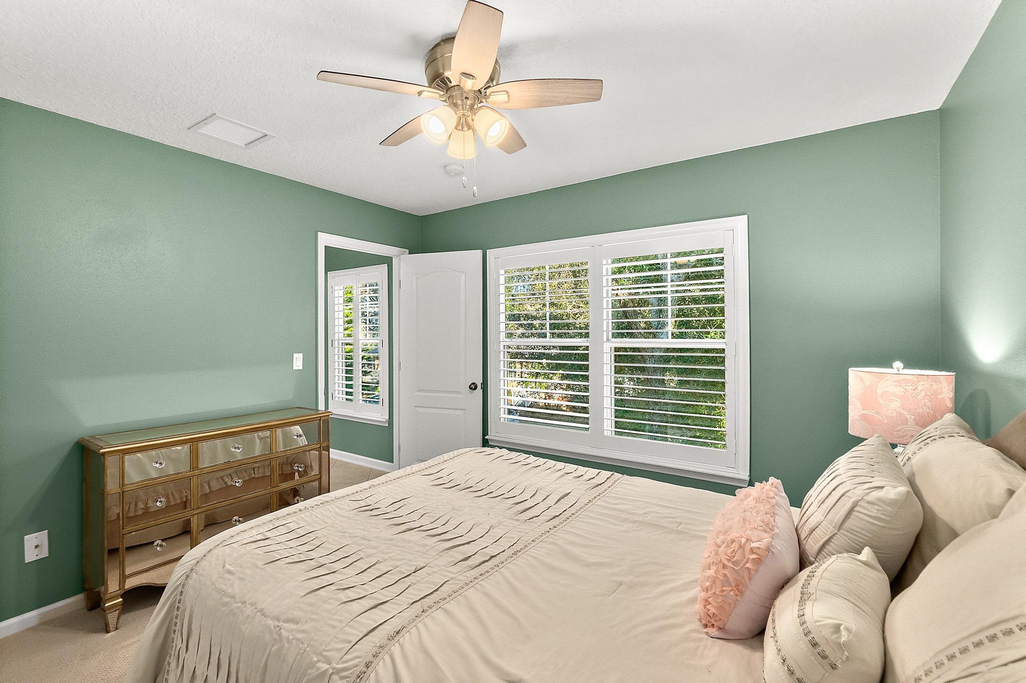 915 Saltwater Circle St. Augustine, FL 32080 - Photo 35 of 60 Carpeted bedroom featuring baseboards and a ceiling fan