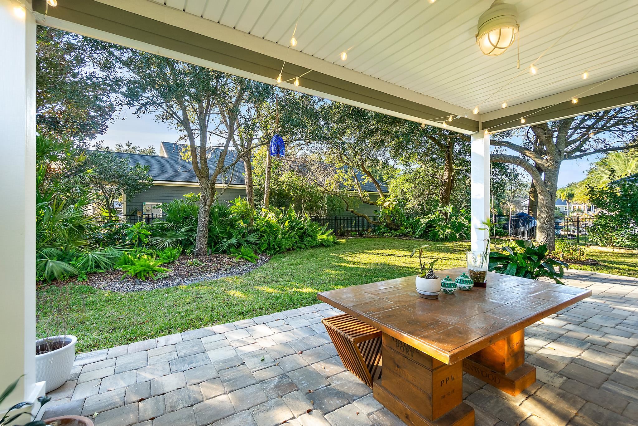 915 Saltwater Circle St. Augustine, FL 32080 - Photo 39 of 60 Fenced backyard featuring outdoor dining space and a patio area