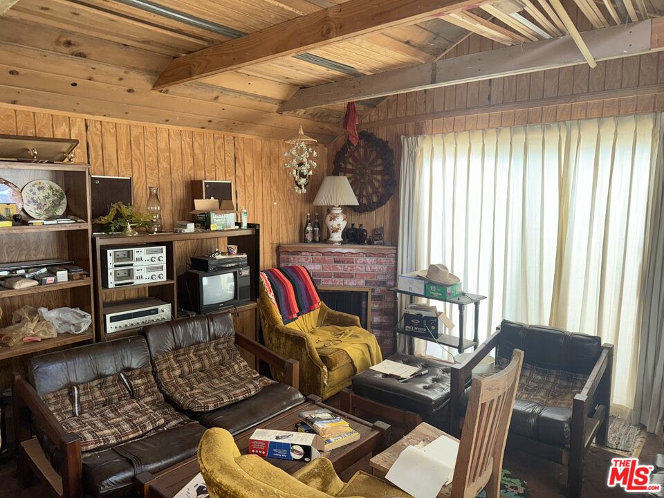21801 Plunge Road Cedarpines Park, CA 92322 - Photo 5 of 6 a living room with furniture and a window