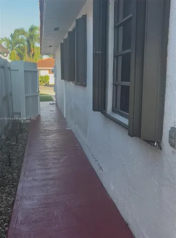 a utility room with sink dryer and washer