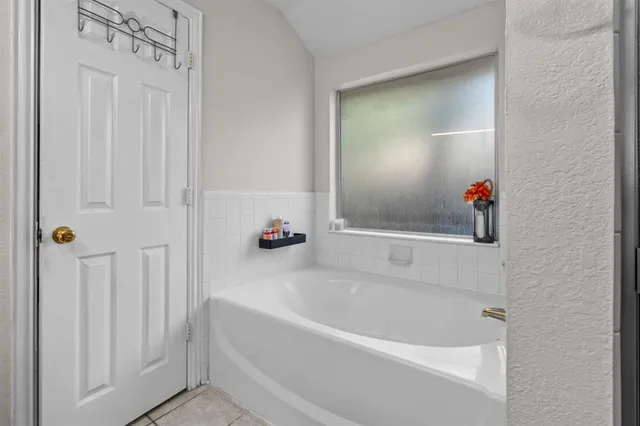 a bathroom with a bathtub