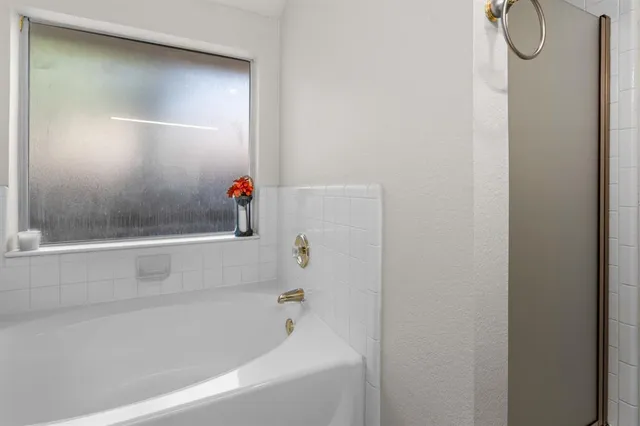 a bathroom with a bathtub