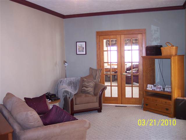 6697 North Lake Road Lena, IL 61048 - Photo 8 of 9 a living room with furniture and a window