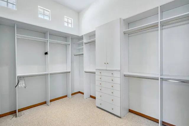 a view of an empty walk in closet