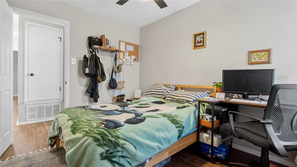 a bathroom with a bathtub and a window