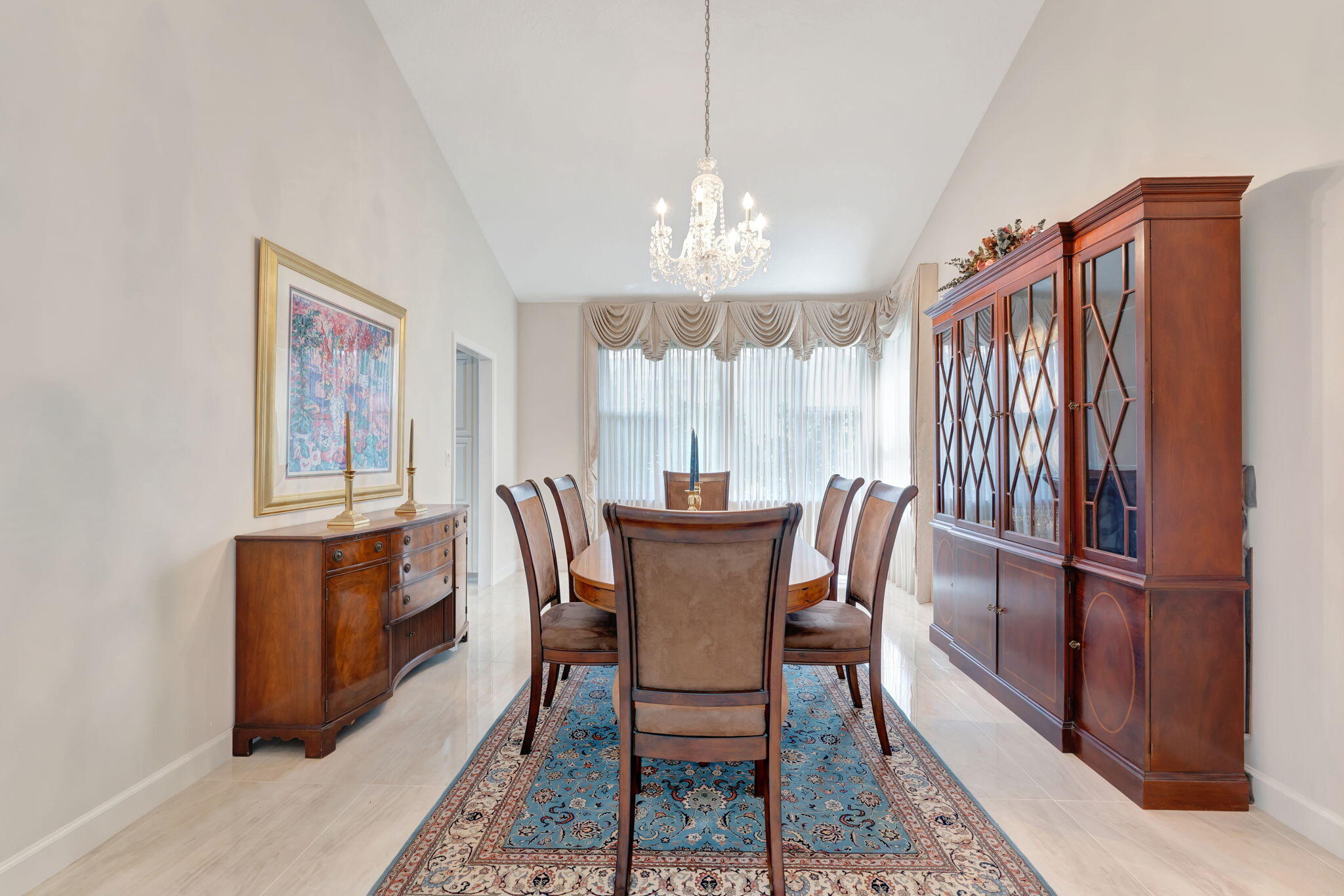 6039 Northwest 31st Terrace Boca Raton, FL 33496 - Photo 14 of 70 a view of a dining room with furniture window and wooden floor