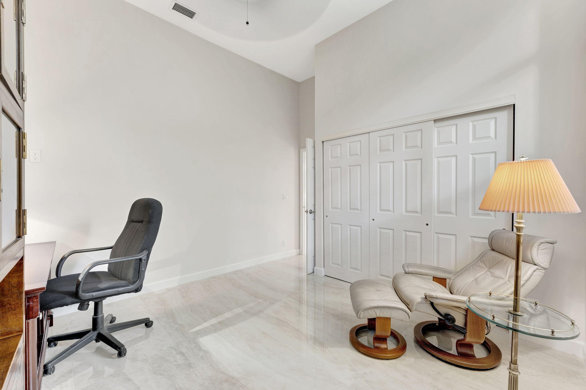 6039 Northwest 31st Terrace Boca Raton, FL 33496 - Photo 39 of 70 a view of a workspace with furniture and a window