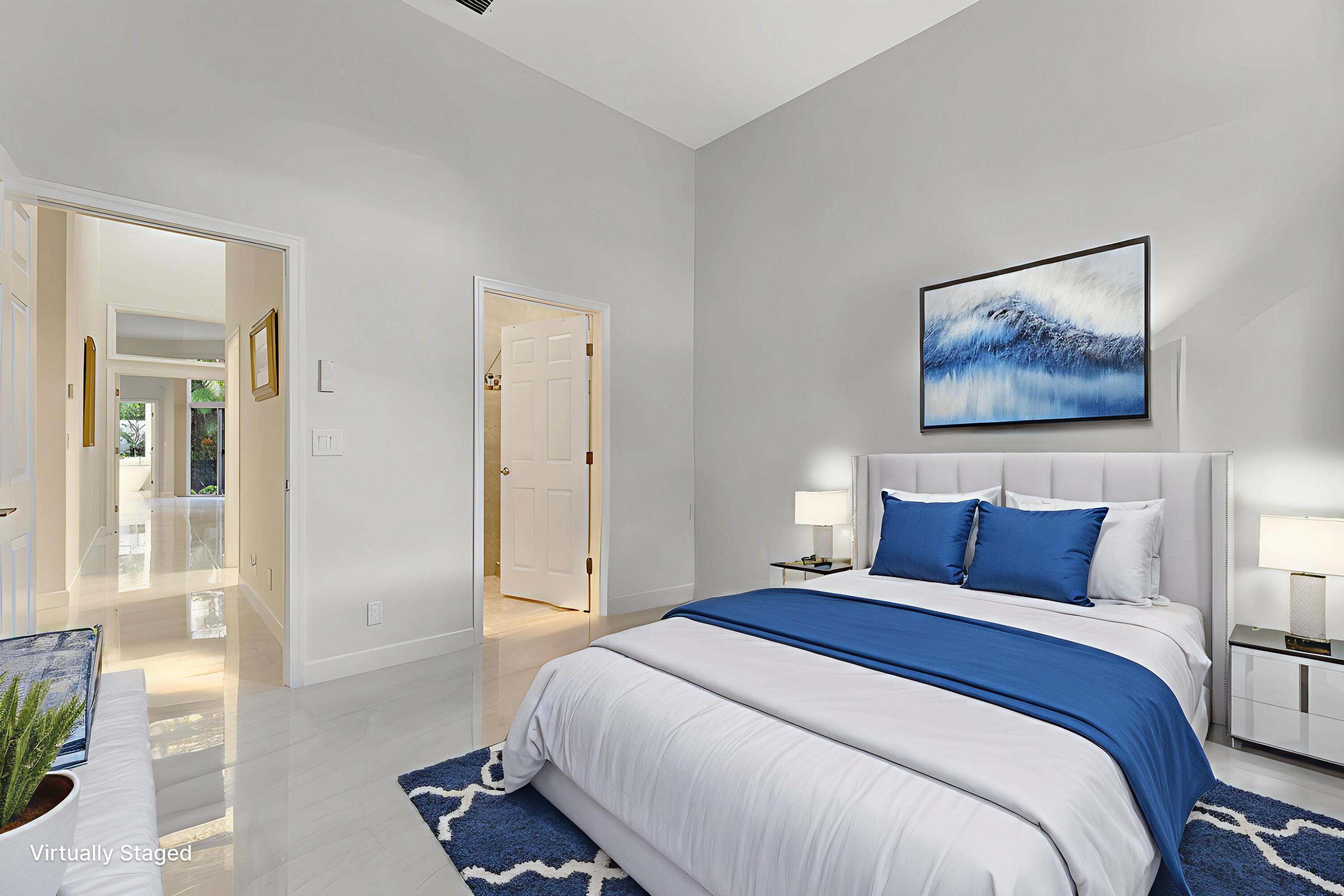 6039 Northwest 31st Terrace Boca Raton, FL 33496 - Photo 53 of 70 a bedroom with a bed and a painting on the wall