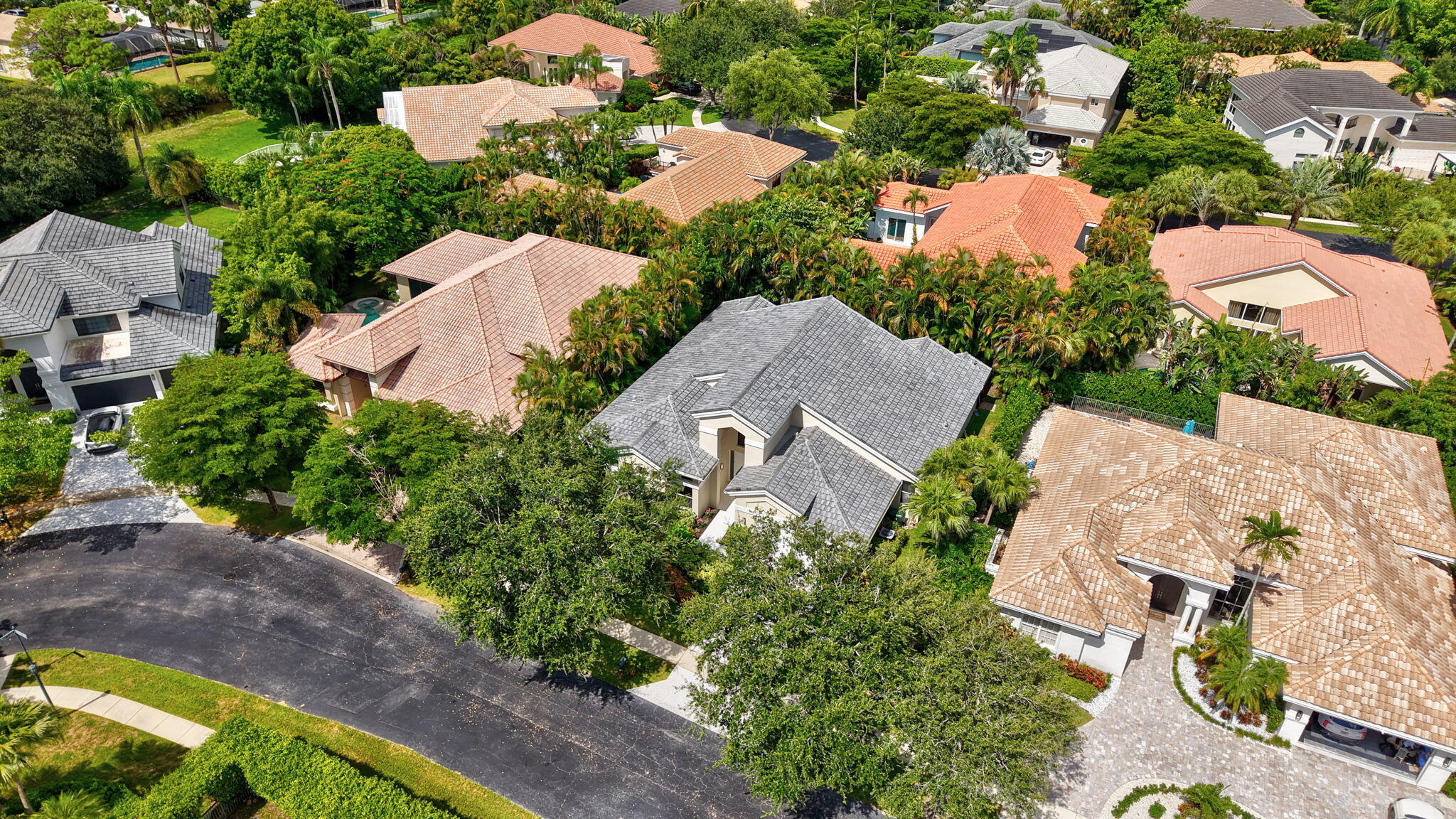 6039 Northwest 31st Terrace Boca Raton, FL 33496 - Photo 68 of 70 an aerial view of a house with a yard and garden