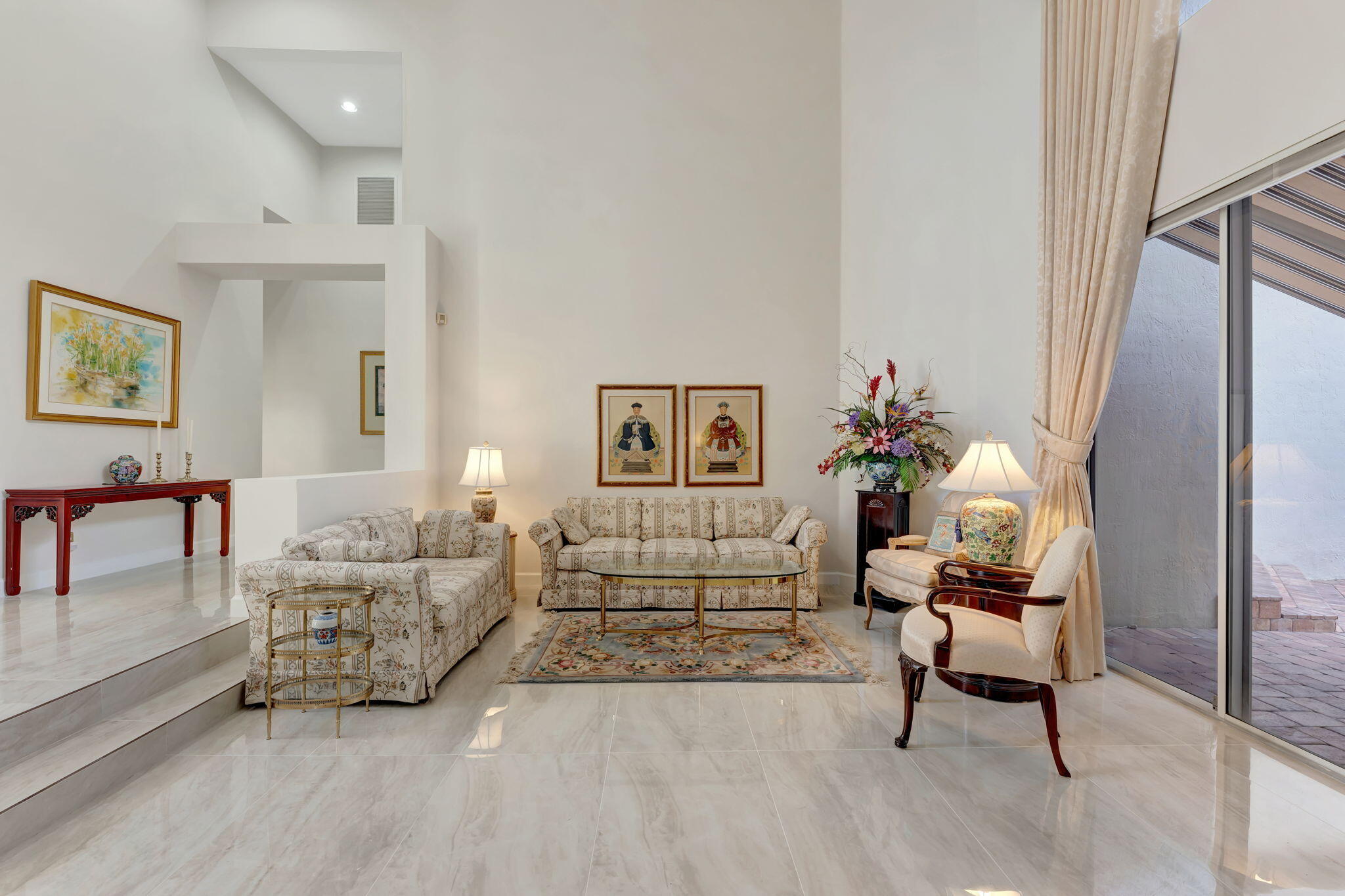 6039 Northwest 31st Terrace Boca Raton, FL 33496 - Photo 8 of 70 a living room with furniture and a potted plant