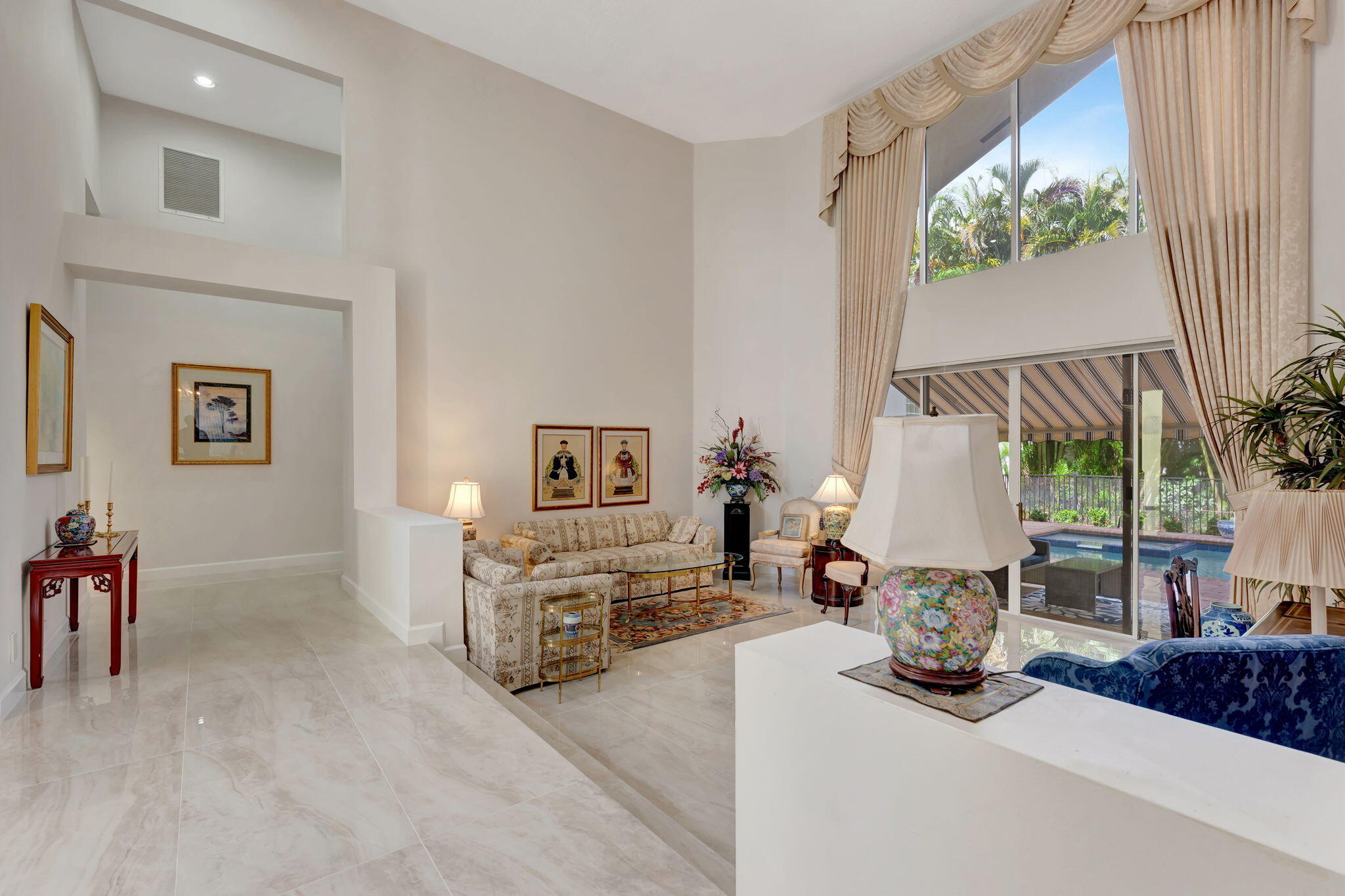 6039 Northwest 31st Terrace Boca Raton, FL 33496 - Photo 10 of 70 a living room with furniture