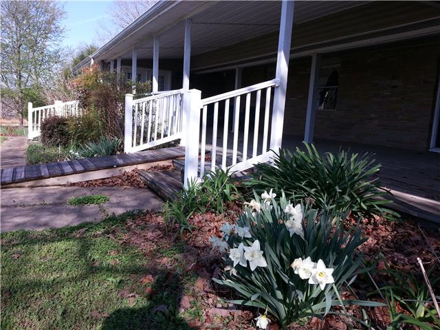 2792 Grays Bend Road Centerville, TN 37033 - Photo 3 of 14 a view of a backyard with a garden