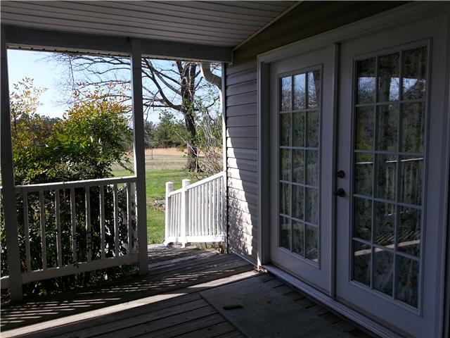 2792 Grays Bend Road Centerville, TN 37033 - Photo 5 of 14 a view of a balcony with wooden floor