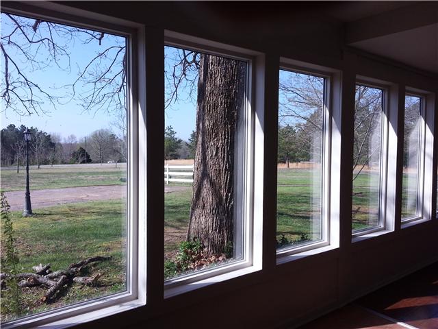 2792 Grays Bend Road Centerville, TN 37033 - Photo 7 of 14 a view of a room that has a large window and a yard