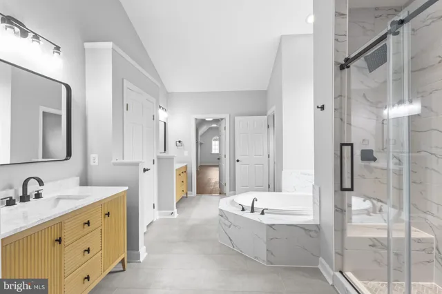 a kitchen with a sink and a refrigerator