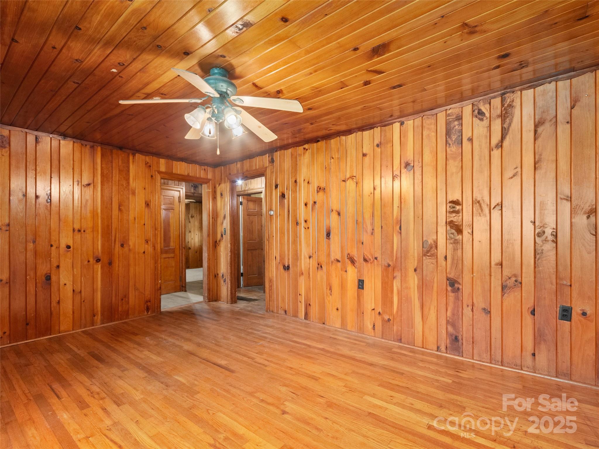 49 Caring Pl Loop Clyde, NC 28721 - Photo 8 of 18 a view of a room with a chandelier