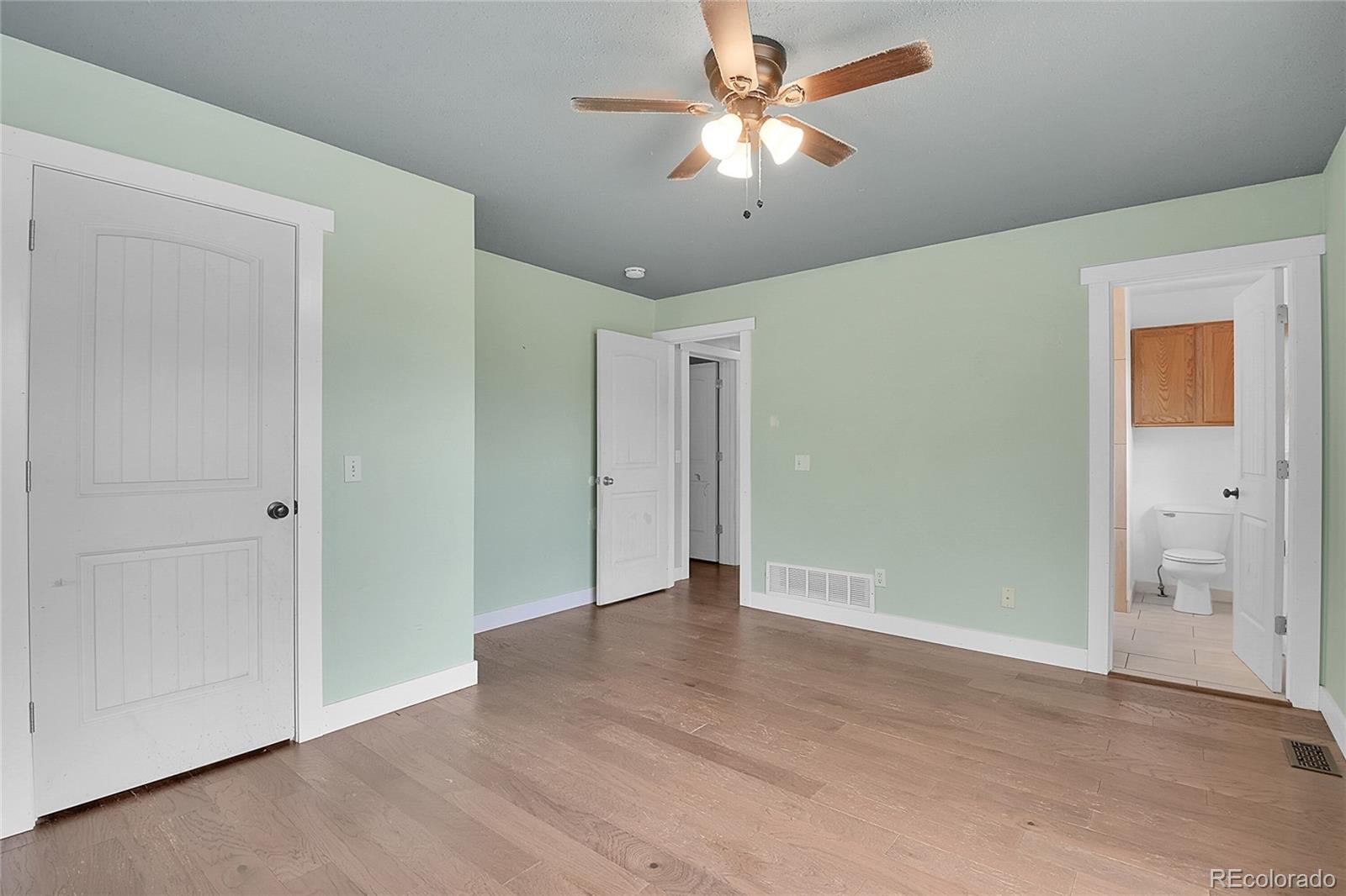 211 Chalet Drive Black Hawk, CO 80422 - Photo 11 of 36 a view of an empty room with a fan
