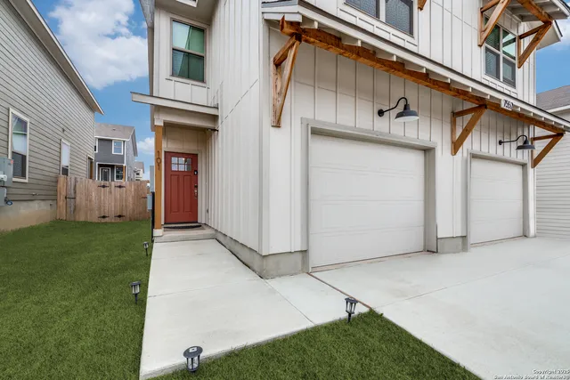 a view of a house with a garage