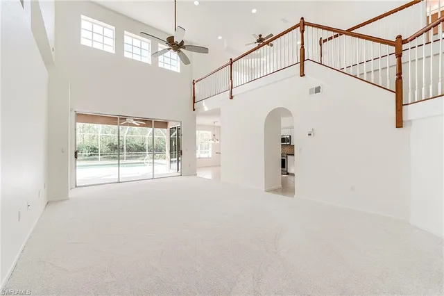 a view of a room with a large window