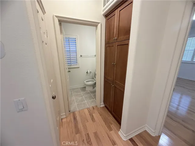 a view of a bathroom from a hallway