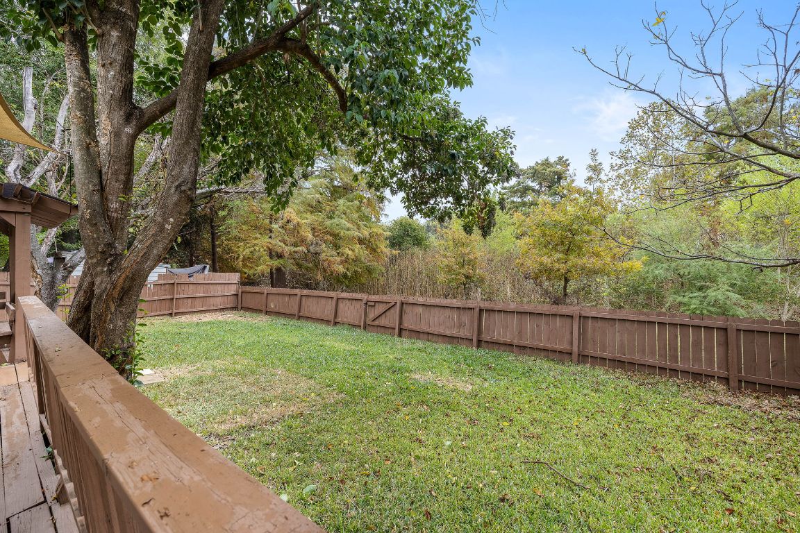 2013 Cervin Boulevard Austin, TX 78728 - Photo 20 of 31 a view of a backyard with wooden fence