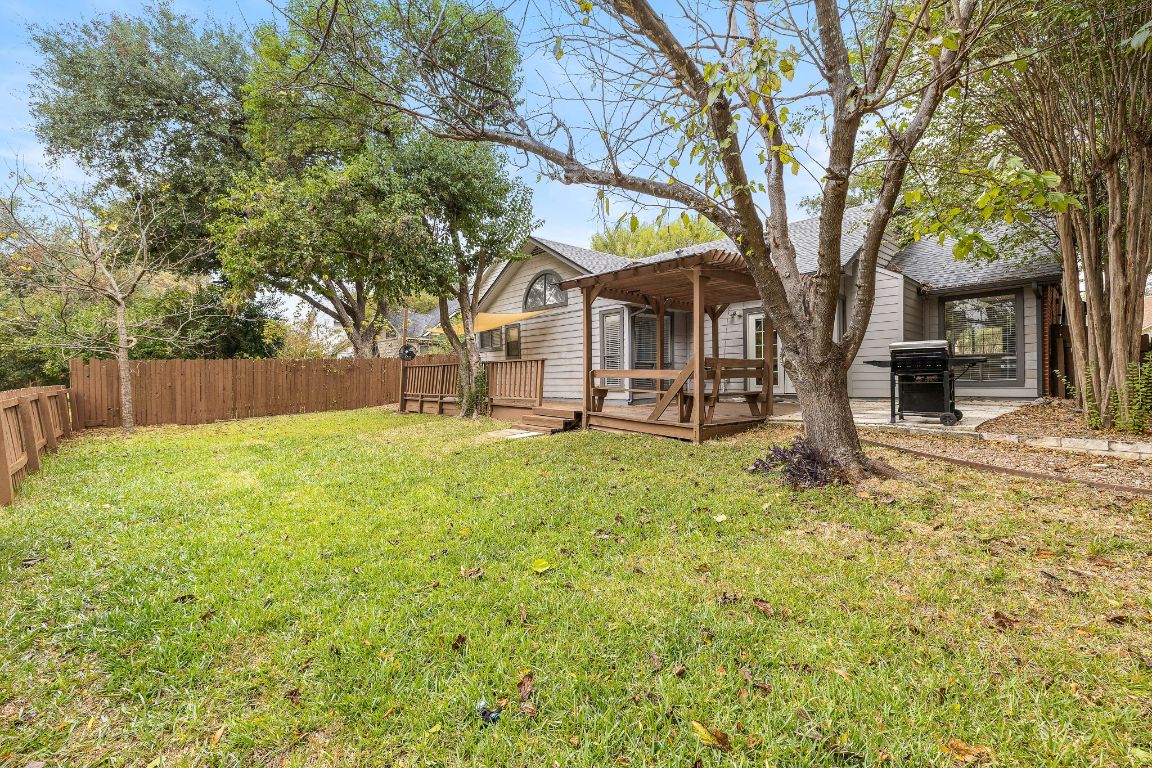 2013 Cervin Boulevard Austin, TX 78728 - Photo 22 of 31 a view of a house with a tree in the yard