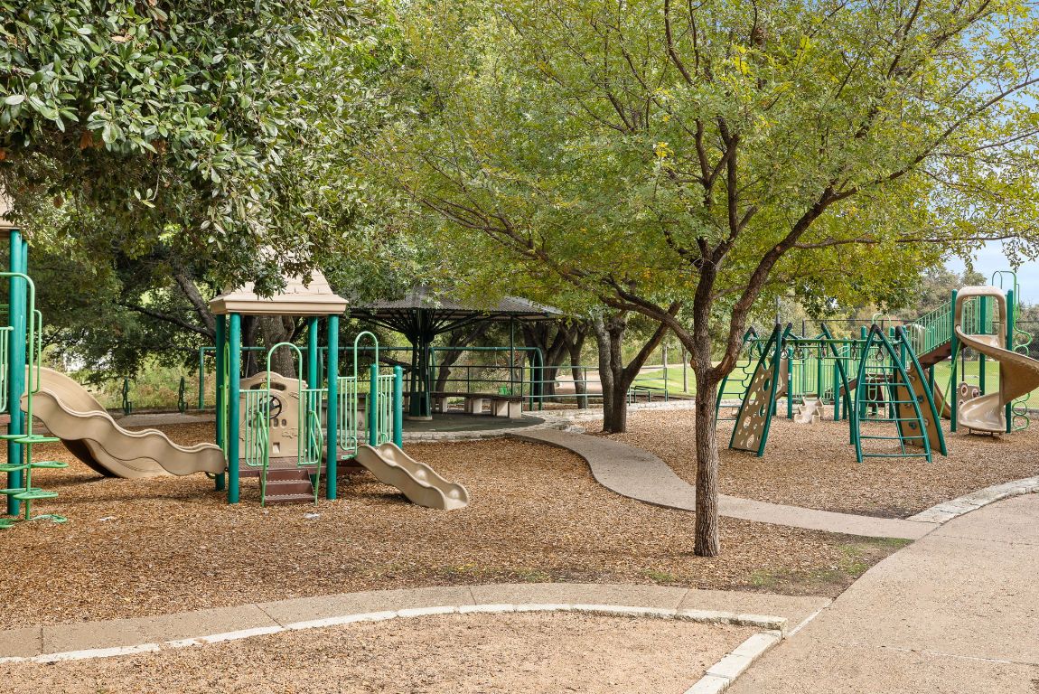 2013 Cervin Boulevard Austin, TX 78728 - Photo 25 of 31 a view of a house with backyard and trees